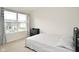 Bright bedroom with large window and ample space at 6329 Basden Dr, Indianapolis, IN 46221