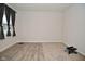 Spacious living room with hardwood and carpeted floors at 6329 Basden Dr, Indianapolis, IN 46221