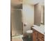 Small bathroom with shower, toilet, and wood vanity at 8429 Admirals Cv, Indianapolis, IN 46236