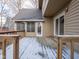 Spacious wooden deck partially covered in snow at 8530 Bluefin Cir, Indianapolis, IN 46236