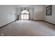 Bright main bedroom featuring a large window and vaulted ceiling at 8530 Bluefin Cir, Indianapolis, IN 46236