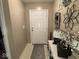 Inviting entryway with neutral walls and a decorative console table at 1080 Spring Meadow Ct, Franklin, IN 46131