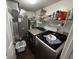 Well-equipped laundry room with washer, dryer, and ample storage at 1080 Spring Meadow Ct, Franklin, IN 46131