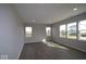 Bright living room with gray walls and multiple windows at 16816 Silo Meadows Dr, Noblesville, IN 46060