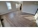 Spacious living room featuring wood-look flooring at 1910 N Riley Ave, Indianapolis, IN 46218