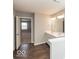 Double vanity bathroom with a view into a bedroom at 2400 Oakmont Dr, Plainfield, IN 46168