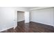 Bright bedroom featuring hardwood floors and an open floor plan at 2400 Oakmont Dr, Plainfield, IN 46168