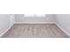 Well-lit bedroom with neutral walls and carpet at 2400 Oakmont Dr, Plainfield, IN 46168