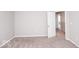 Spacious bedroom with neutral walls and carpet at 2400 Oakmont Dr, Plainfield, IN 46168