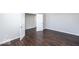 Spacious bedroom with hardwood floors and neutral-toned walls at 2400 Oakmont Dr, Plainfield, IN 46168