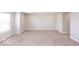 Spacious bedroom with large window and neutral decor at 2400 Oakmont Dr, Plainfield, IN 46168