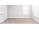 Bright bedroom with neutral walls and carpet at 2400 Oakmont Dr, Plainfield, IN 46168