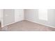 Bright bedroom featuring neutral walls and carpet at 2400 Oakmont Dr, Plainfield, IN 46168