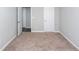 Empty bedroom with neutral walls and carpet at 2400 Oakmont Dr, Plainfield, IN 46168