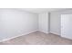Simple bedroom with neutral walls and carpet at 2400 Oakmont Dr, Plainfield, IN 46168