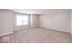 Bright bedroom with window and neutral carpet at 2400 Oakmont Dr, Plainfield, IN 46168
