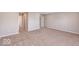 Ample bonus room offering neutral wall colors and carpet at 2400 Oakmont Dr, Plainfield, IN 46168