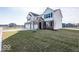 Two-story home with brick and siding exterior at 2400 Oakmont Dr, Plainfield, IN 46168