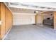 Unfinished two-car garage with concrete floor at 2400 Oakmont Dr, Plainfield, IN 46168