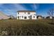 Two-story house with a large backyard and patio at 2400 Oakmont Dr, Plainfield, IN 46168