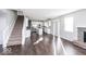 Open concept kitchen with hardwood floors and island at 2400 Oakmont Dr, Plainfield, IN 46168