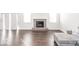 Bright living room with fireplace and hardwood floors at 2400 Oakmont Dr, Plainfield, IN 46168