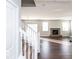 Sunlit living room with hardwood floors and fireplace at 2400 Oakmont Dr, Plainfield, IN 46168