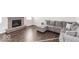 Living room features a fireplace and hardwood floors at 2400 Oakmont Dr, Plainfield, IN 46168