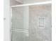 Close-up of a clean shower with gray tile and glass enclosure at 2400 Oakmont Dr, Plainfield, IN 46168