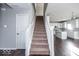 Modern staircase leading to the upper level at 2400 Oakmont Dr, Plainfield, IN 46168