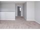 Upper level with carpeted floors and an open layout at 2400 Oakmont Dr, Plainfield, IN 46168