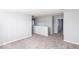 Upper level with carpeted floors and access to other rooms at 2400 Oakmont Dr, Plainfield, IN 46168
