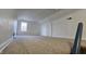 Large attic bedroom with carpeted floor and window at 2640 E Midland Rd, Indianapolis, IN 46227