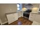 Modern kitchen with stainless steel appliances and white cabinets at 2640 E Midland Rd, Indianapolis, IN 46227