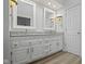 Bathroom boasts double vanity with granite countertop at 3039 River Bay N Dr, Indianapolis, IN 46240