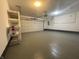 Spacious garage featuring epoxy flooring and ample storage at 3039 River Bay N Dr, Indianapolis, IN 46240