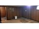 Unfinished basement with wood paneling and open space at 3241 N Riley Ave, Indianapolis, IN 46218