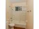 Bathroom with shower/tub combo and vinyl flooring at 3322 N Whittier Pl, Indianapolis, IN 46218