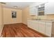 Kitchen with granite countertops and white cabinets at 3322 N Whittier Pl, Indianapolis, IN 46218