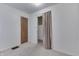 Simple bedroom with neutral walls and carpeting at 3525 N Olney St, Indianapolis, IN 46218