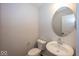 Small powder room with toilet and sink at 3923 Holly Brook Dr, Westfield, IN 46062