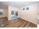 Bright dining area with hardwood floors and sliding glass doors to patio at 3923 Holly Brook Dr, Westfield, IN 46062