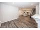 Open concept kitchen with island, stainless steel appliances, and hardwood floors at 3923 Holly Brook Dr, Westfield, IN 46062