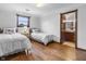 Bedroom with hardwood floors and two twin beds at 4564 Bayberry Ln, Zionsville, IN 46077