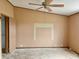 Bedroom with ceiling fan and built-in shelving at 4726 E 210 N, Lebanon, IN 46052