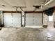 Large three-car garage, offering ample storage space at 4726 E 210 N, Lebanon, IN 46052