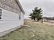 Gray siding house exterior with a large tree in the background at 4726 E 210 N, Lebanon, IN 46052
