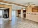 Open living room with kitchen and wood stove view at 4726 E 210 N, Lebanon, IN 46052