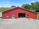 Exterior of red barn featuring large garage door at 7955 W 400 N, Boggstown, IN 46110