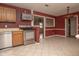 Kitchen with stainless steel appliances and wood cabinets at 8105 Allisonville Rd, Indianapolis, IN 46250